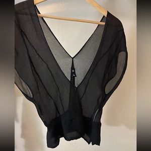 Sheer, see-through black top